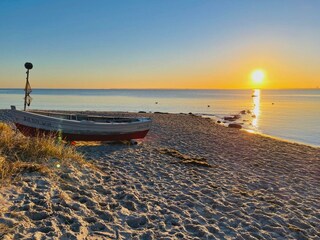Sonnenaufgang mit Fischerboot