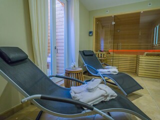 Eigene Sauna mit angrenzender Dusche und WC