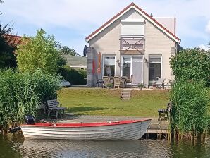 Ferienhaus mit kleinem Ruderboot - Makkum - image1