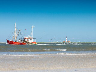 Sankt Peter Strand mit Blick Westerhever Leuchtturm