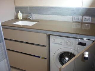 Washing machine in private bathroom