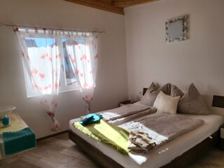 bright bedroom with its own vanity