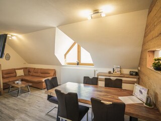 Cozy living area in the Amethyst apartment.