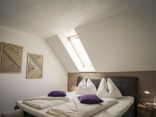 Wohnliches Schlafzimmer 1 in FeWo Amethyst.