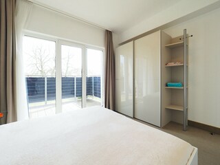 Strandpalais Ferienwohnung 13 - Schlafzimmer