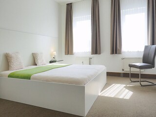 Strandpalais Ferienwohnung 14 - Schlafzimmer