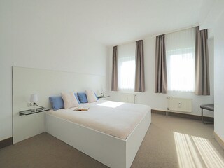 Strandpalais Ferienwohnung 21 - Schlafzimmer