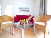 Strandpalais Ferienwohnung 23 -  Wohnzimmer