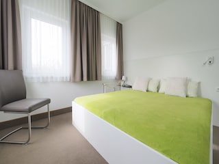 Strandpalais Ferienwohnung 23 - zweites Schlafzimmer