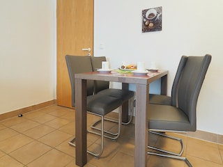 Strandpalais Ferienwohnung 24 - Essbereich