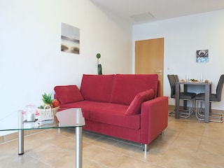 Strandpalais Ferienwohnung 28 -  Wohnzimmer