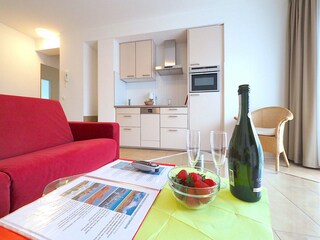 Strandpalais Ferienwohnung 34 -  Wohnzimmer mit Küche