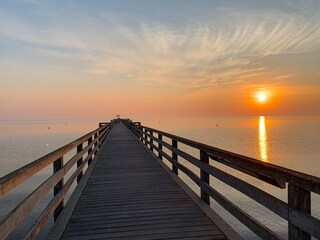Ostseebad Boltenhagen, Sonnenaufgang an der Seebrücke