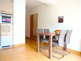 Strandpalais Ferienwohnung 15 - Essbereich