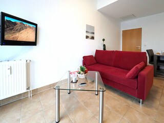 Strandpalais Ferienwohnung 38 -  Wohnzimmer