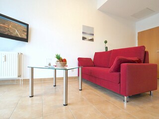 Strandpalais Ferienwohnung 38 -  Wohnzimmer