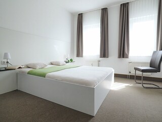 Strandpalais Ferienwohnung 44 - Schlafzimmer