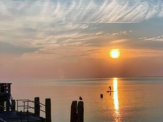 Ostseebad Boltenhagen,  Sonnenaufgang an der Seebrücke