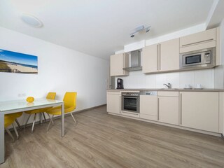 Meeresbrise, Ferienwohnung 07, Essbereich mit Küche