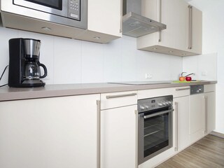 Meeresbrise, Ferienwohnung 09, moderne Küchenzeile