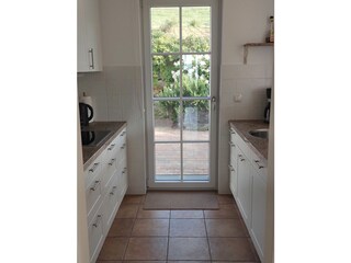 Küche mit Ausgang zur Terrasse