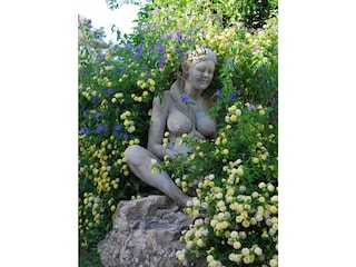 Statue am Eingang von Casa Meca