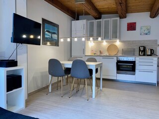 Fitted kitchen with Ceran, oven, dishwasher, fridge