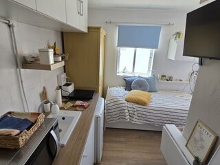 Single bed, TV and work area