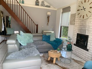Wohnzimmer mit ganz bequemer Eck Couch