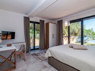 master bedroom with terraces and en-suite bathroom