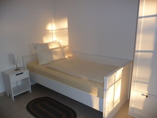 Zweites Schlafzimmer im Abendlicht