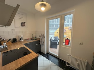 Küche und Balkon