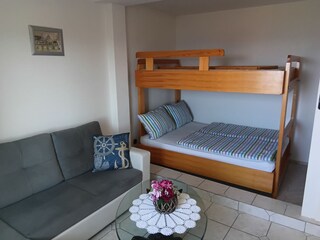 Schlafecke neben Wohnraum