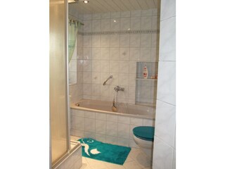 Bathroom with shower, bathtub and toilet