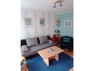 Gemütliches Schlafsofa im Wohnzimmer