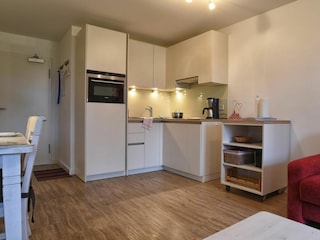 Die moderne Küche ist komplett ausgestattet - hier werden Sie gerne kochen!