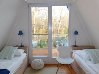 Schlafzimmer mit Einzelbetten