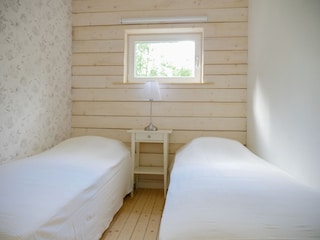 Kleines Schlafzimmer mit 2 Einzelbetten