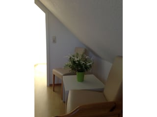 Kleine Sitzecke im Spitzboden