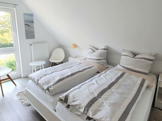 Schlafzimmer 1 (mit 200 x 200m Bett)