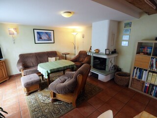 Wohnküche mit Sitzecke und Kamin