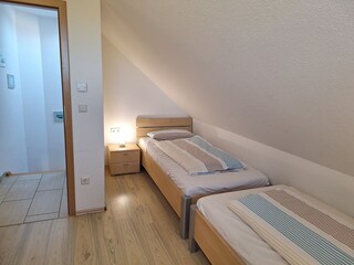 Schlafzimmer mit Einzelbetten