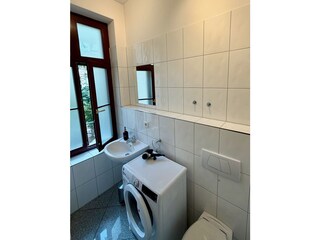 Bathroom with washing machine