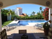 Porche with view over the pool to the Atlantic Ocean