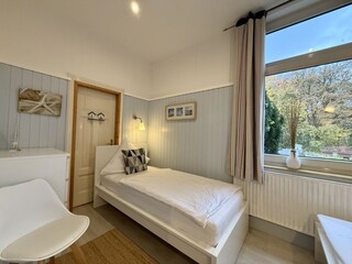 Zweites Schlafzimmer mit zwei Einzelbetten