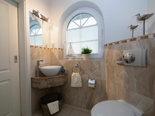 Bad im EG mit Dusche, WC, Waschmaschine