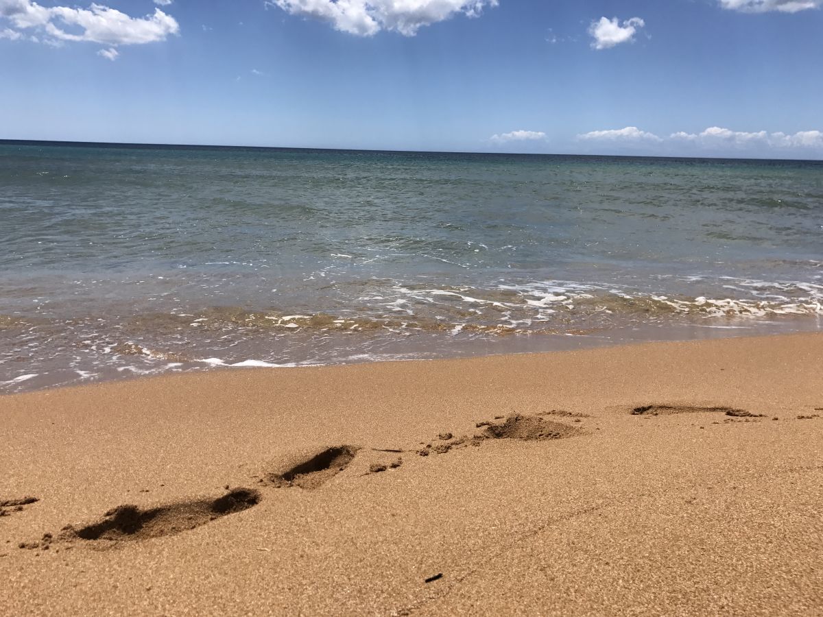 Sandstrand vor dem Haus