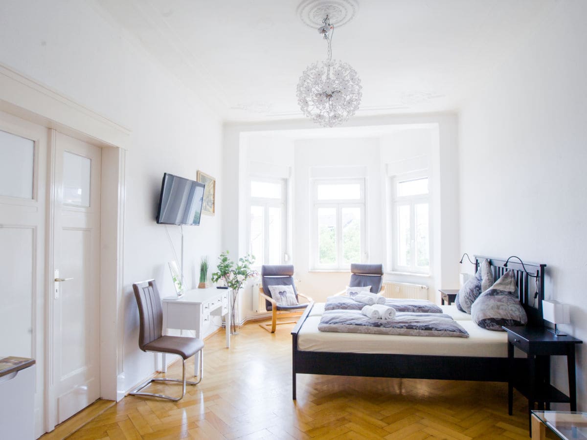 Room with bay window and oak parquet floors