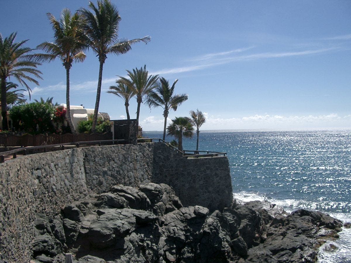 House on rocky outcrop between 2 beaches