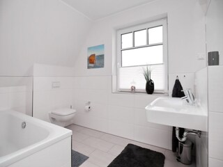 Bathroom with bathtub on the upper floor